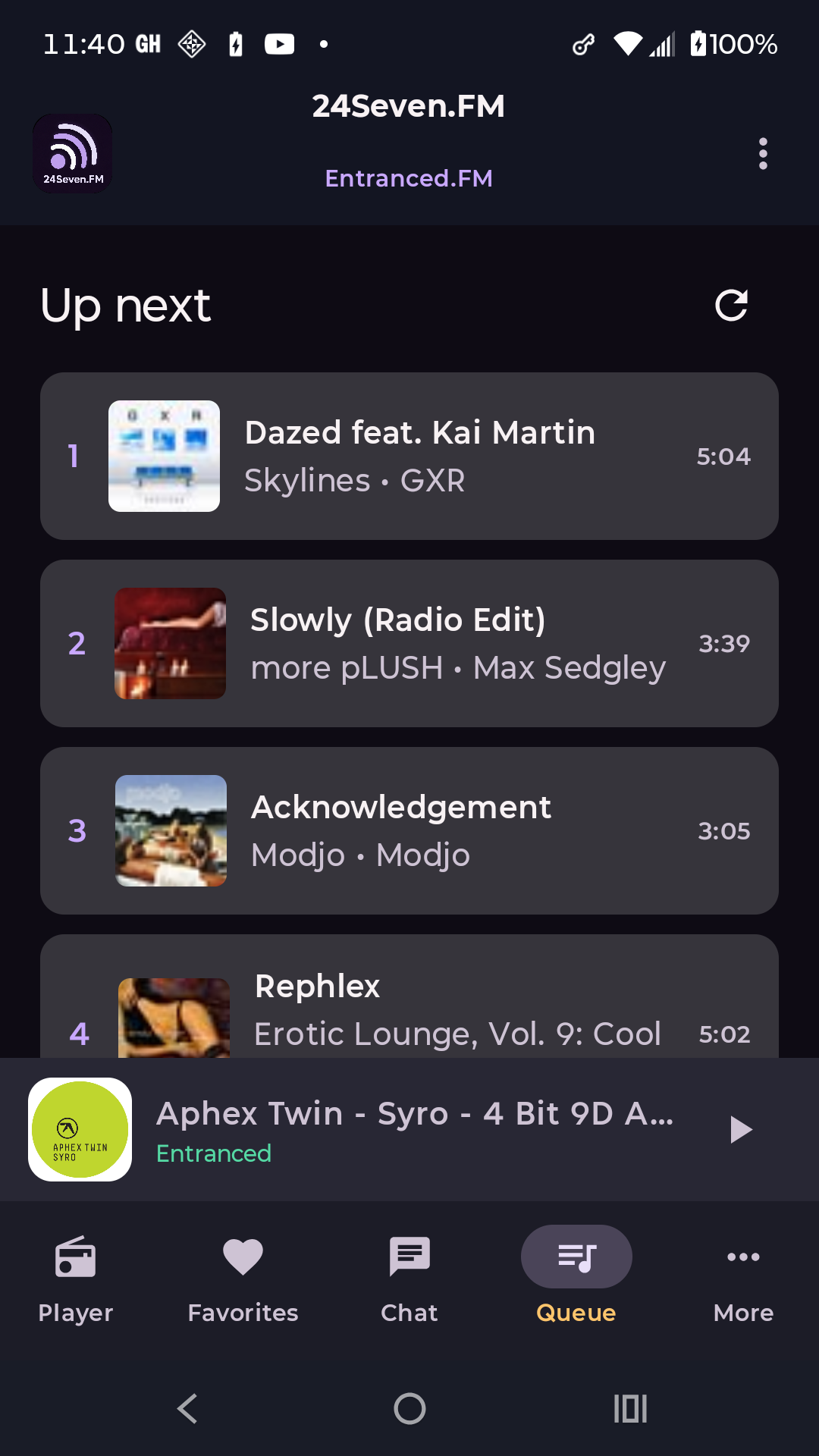 Queue screen showing upcoming tracks and persistent playback controls